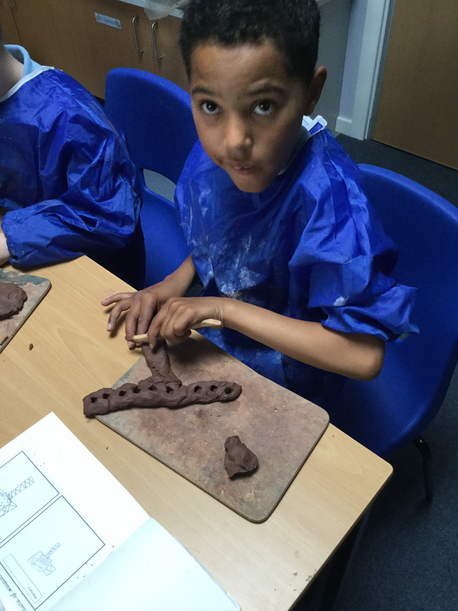Clay modelling in Year 5 Park Spring Primary School